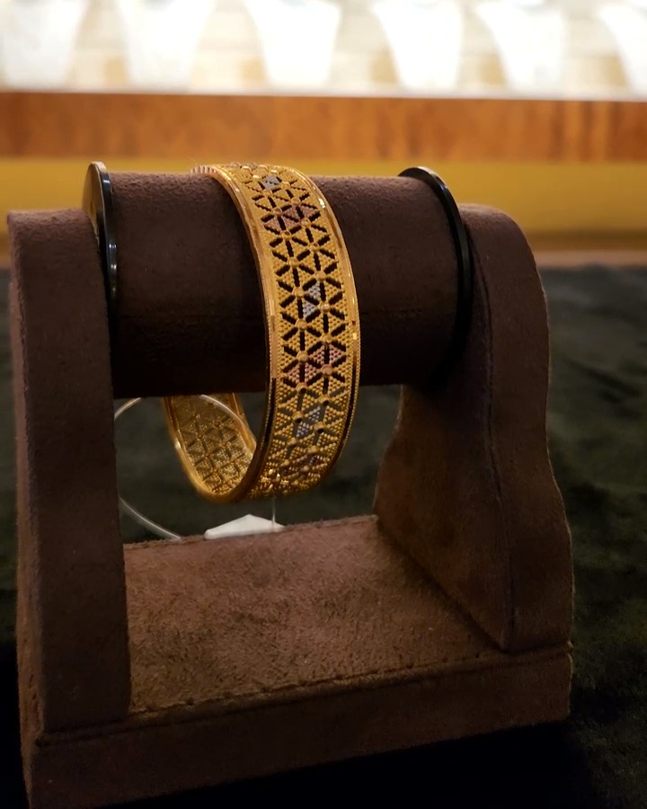 Two Soveriegn gold bangle with multi colour finish MLMGB027.jpg